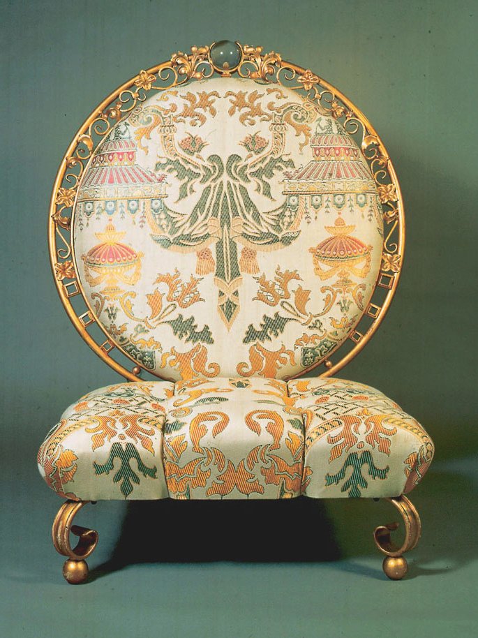 gold chair with green and beige fabric