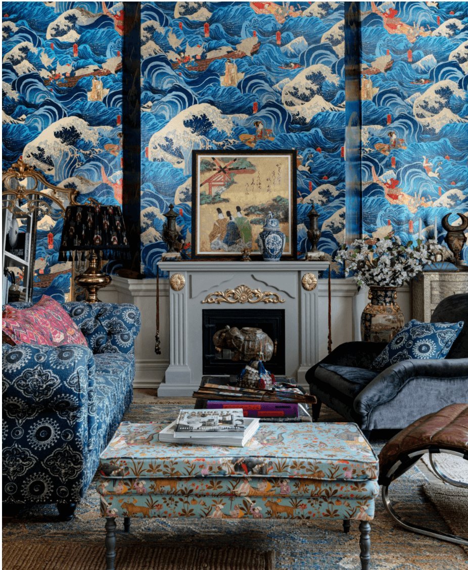 Maximalist room with blue wallpaper