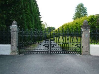Winchester driveway gate with stone piers