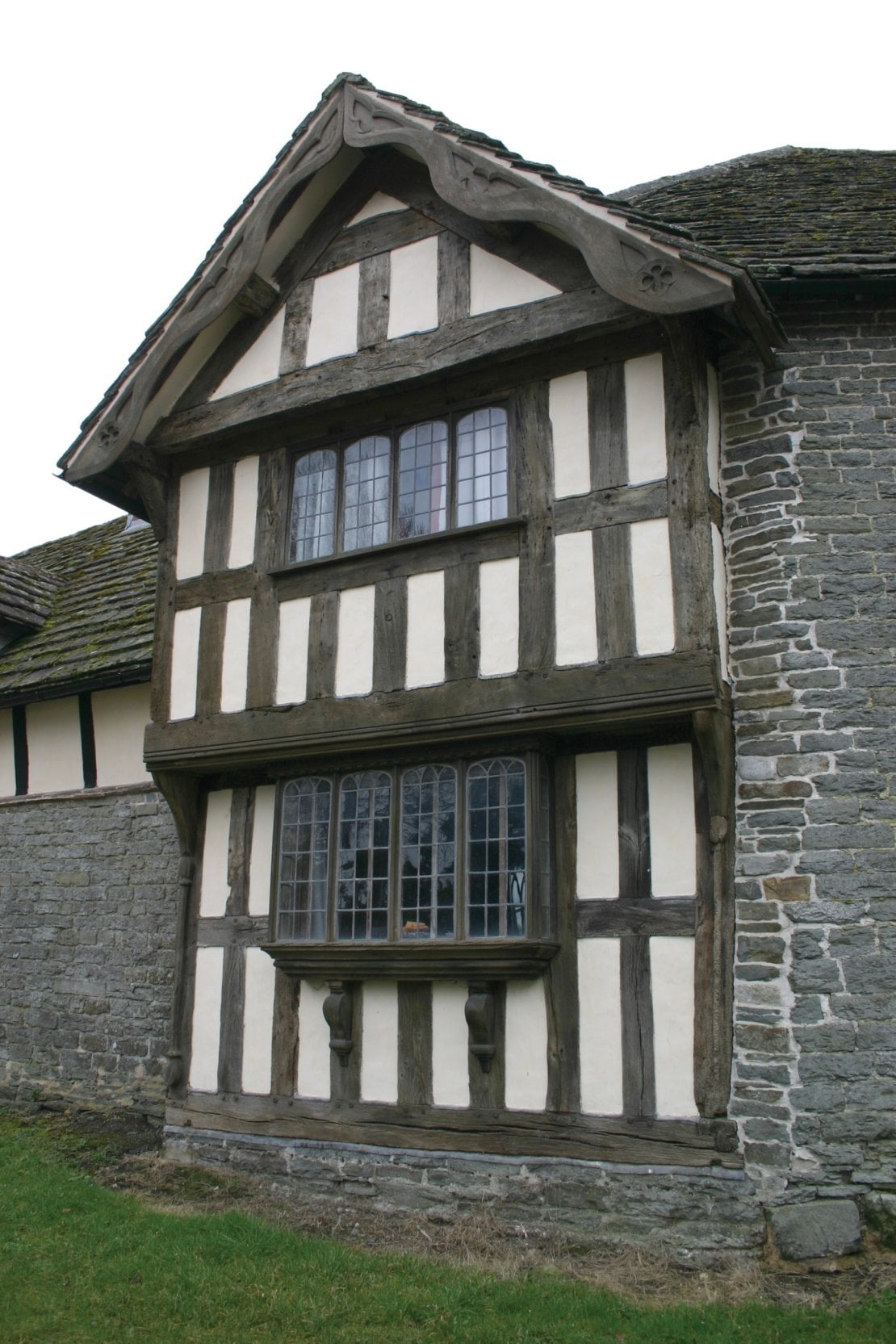 Half timbered Victorian house in grey and white Victorian colour scheme