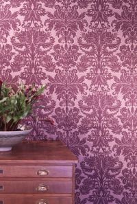 Magenta damask wallpaper in study