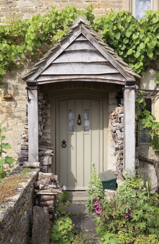 Front door with black ironmongery