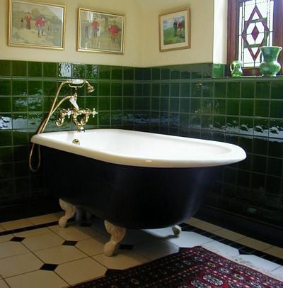 Roll top double ended baths with the taps centrally positioned are French in origin
