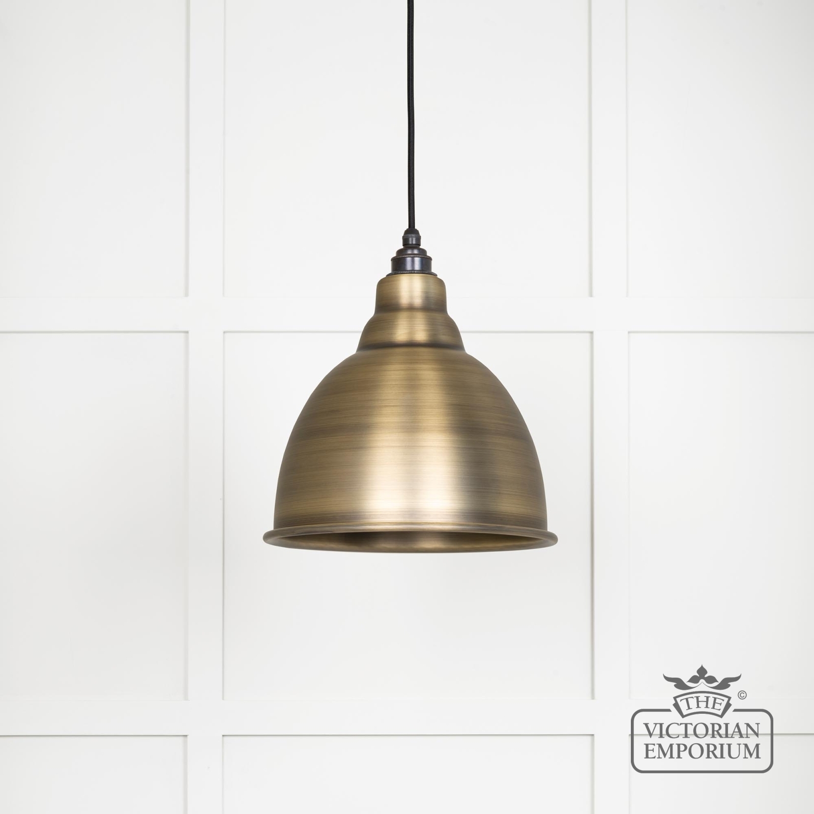 Brindle pendant light in aged brass