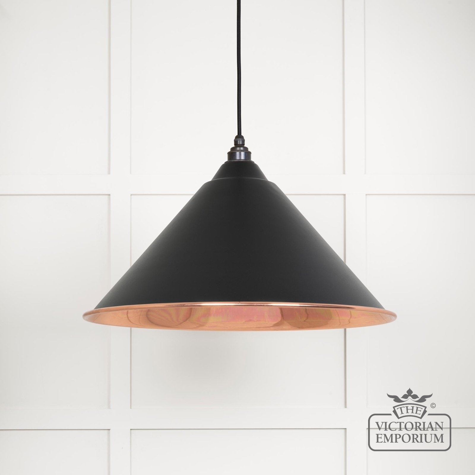 Hockliffe pendant light in Black and smooth copper