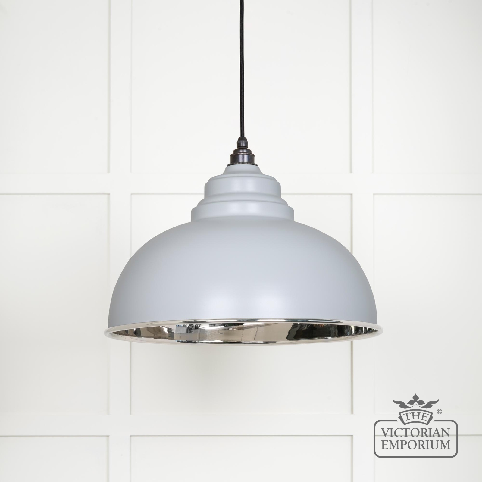 Harlow pendant light in smooth nickel with birch exterior