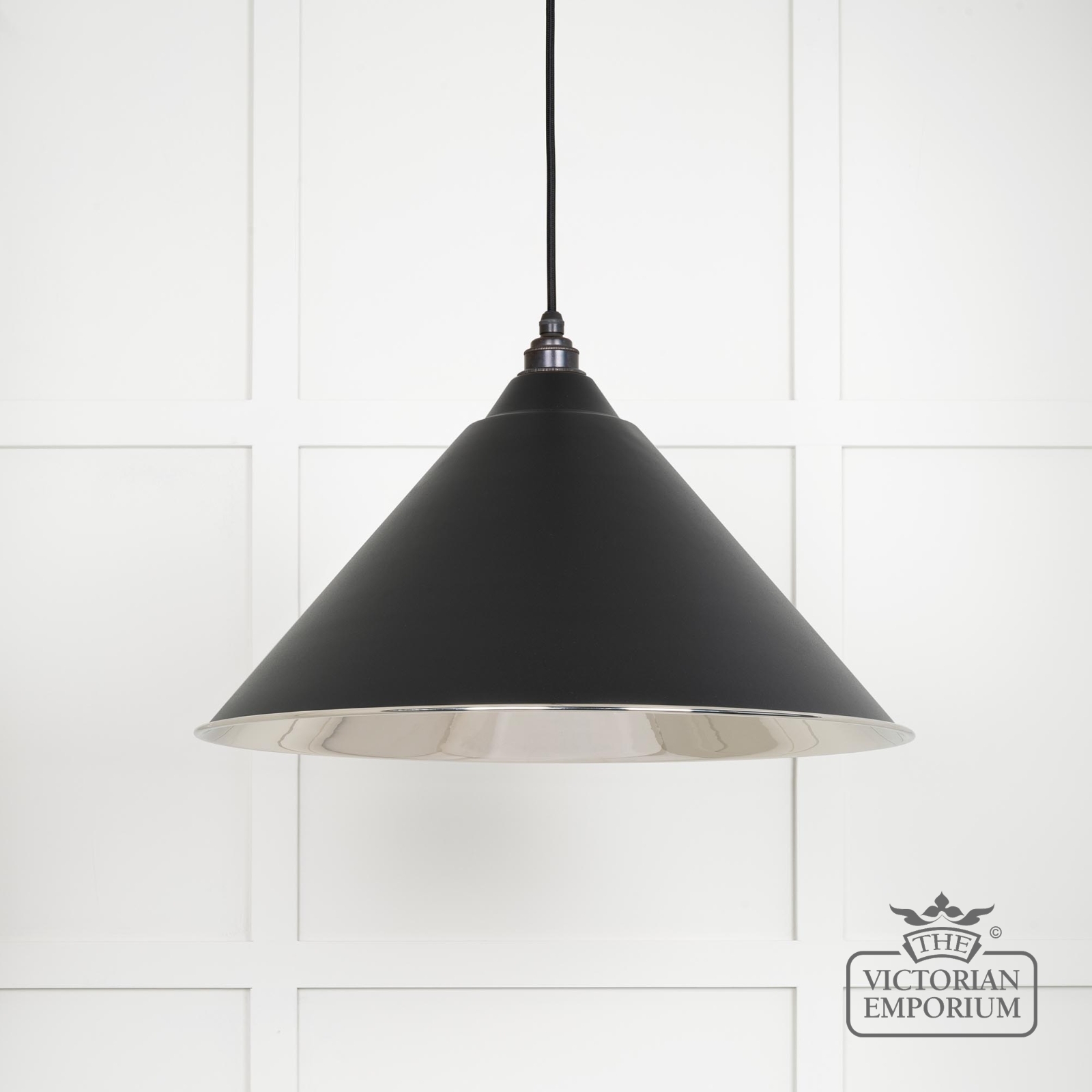 Hockliffe pendant light in smooth nickel and Black exterior