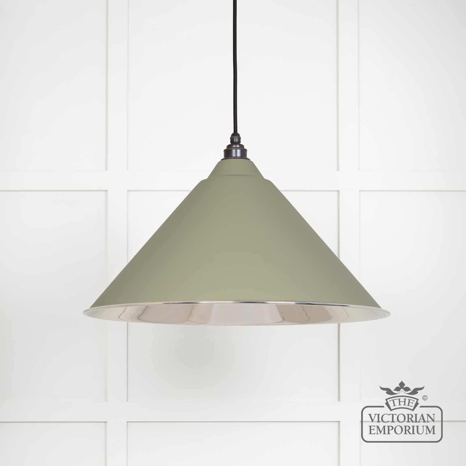 Hockliffe pendant light in smooth nickel and Tump exterior