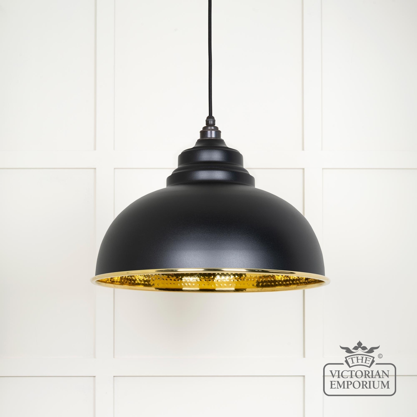 Harlow pendant light in hammered brass with painted Black exterior