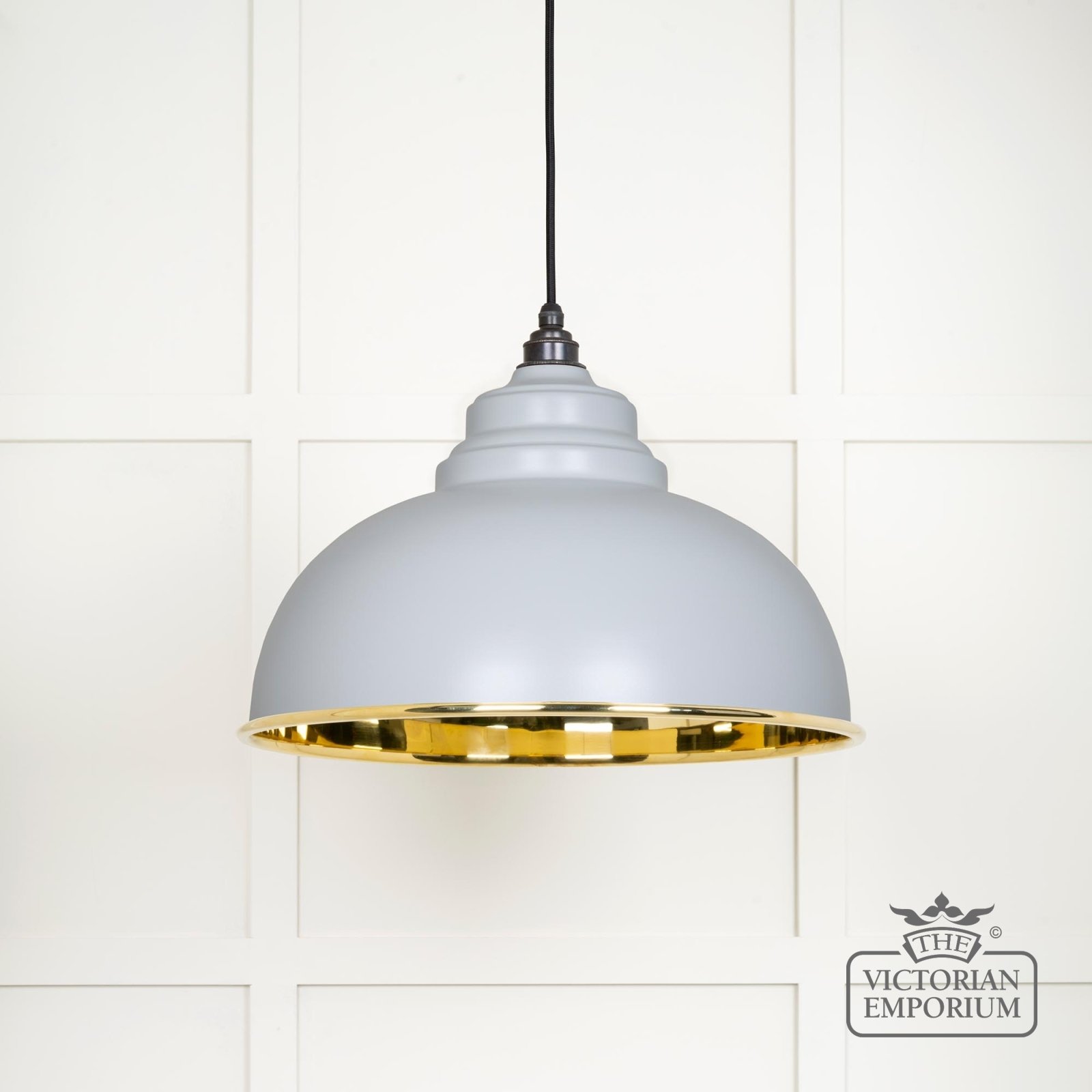 Harlow pendant light in smooth brass with painted Birch exterior
