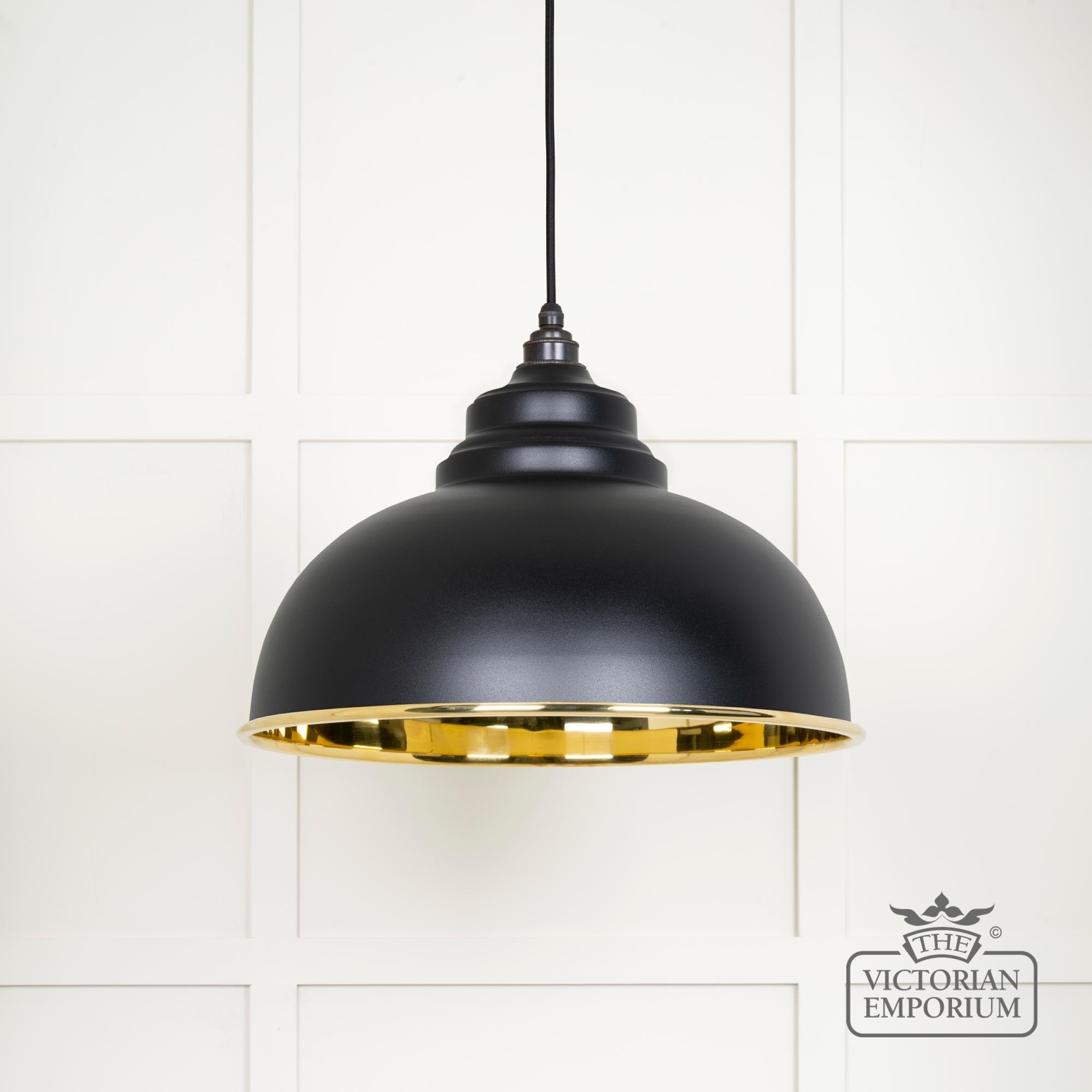 Harlow pendant light in smooth brass with painted Black exterior