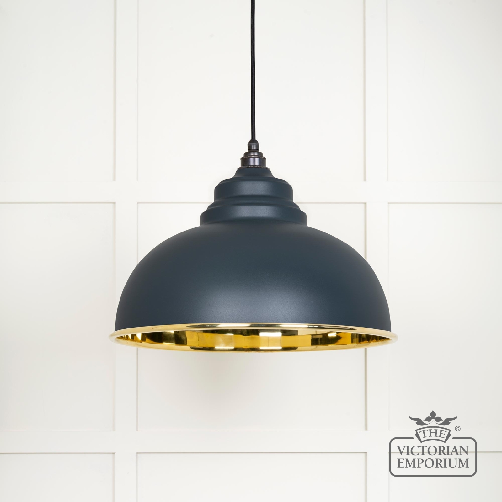 Harlow pendant light in smooth brass with painted Soot exterior
