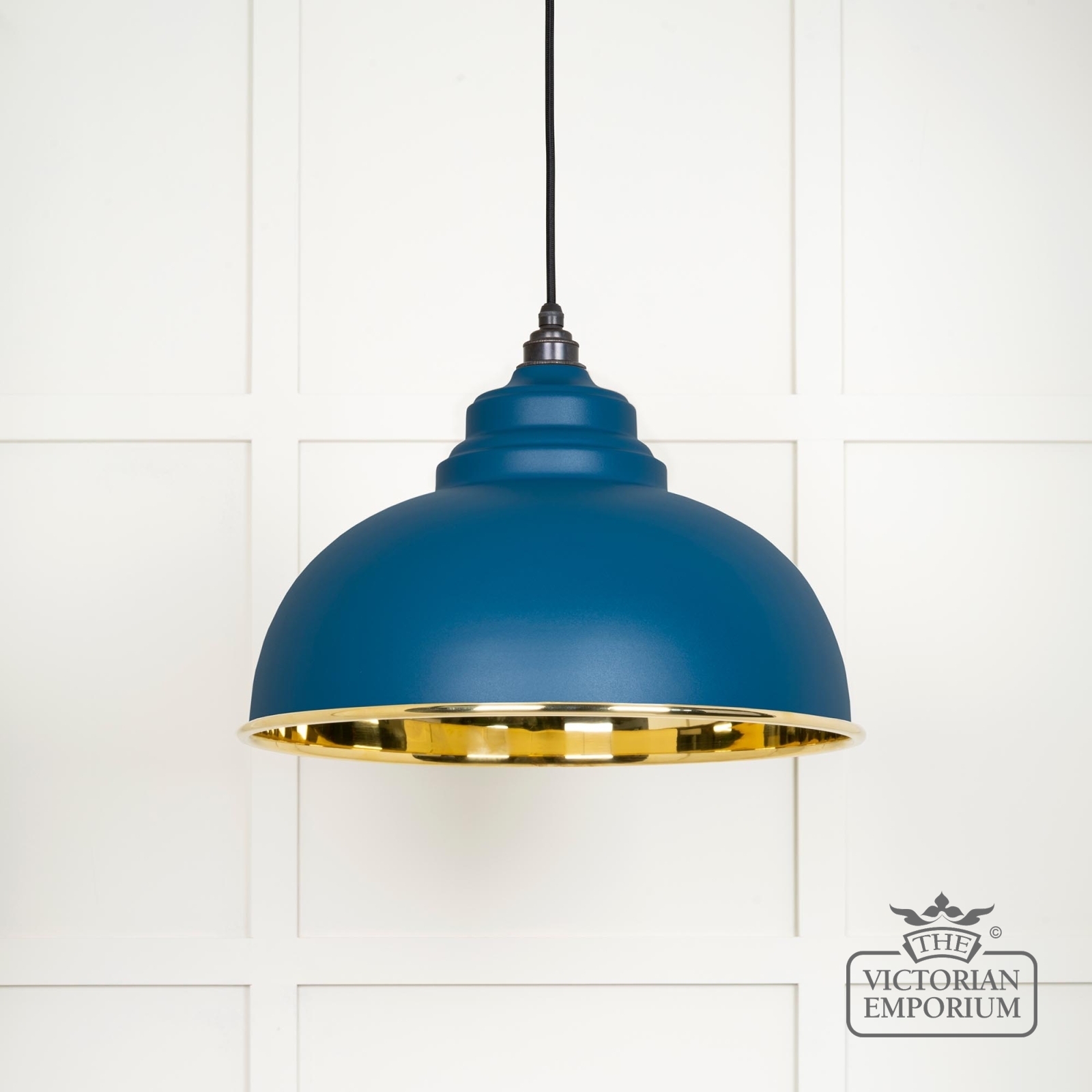 Harlow pendant light in smooth brass with painted Upstream exterior