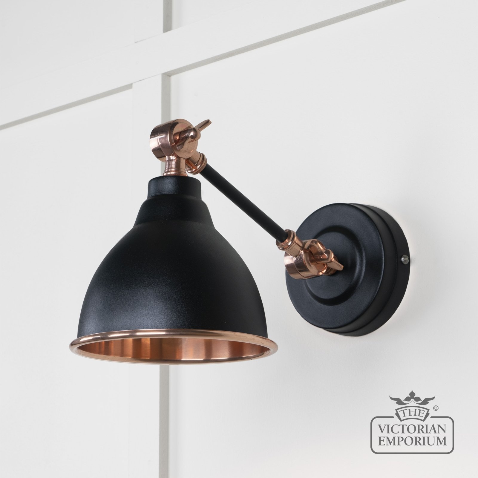 Brindle Wall Light with Smooth Copper Interior and Black Exterior