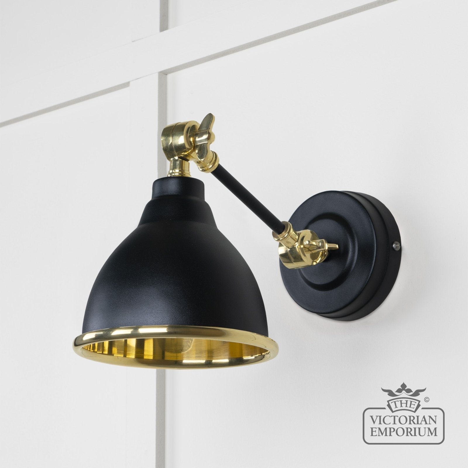 Brindle Wall Light with Smooth Brass Interior and Black Exterior