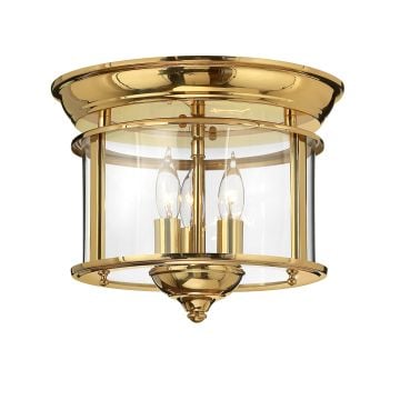 Gentry flush mount light in polished brass
