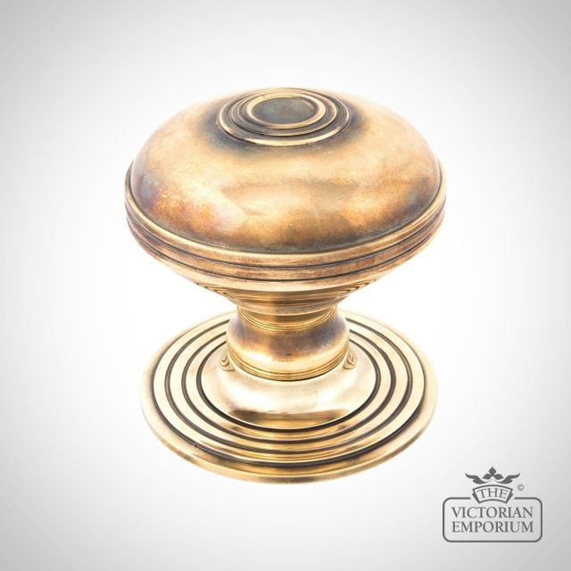 Pressbury centre door knob in Aged Brass