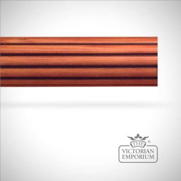 Reeded curtain pole with stained wood and then embellished by hand