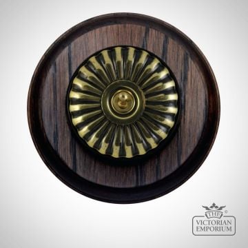 Period Light Switch Fluteted Antique Brass Black Mahogany Circular Base