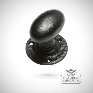 Black iron handcrafted round door knob on rectangular plate