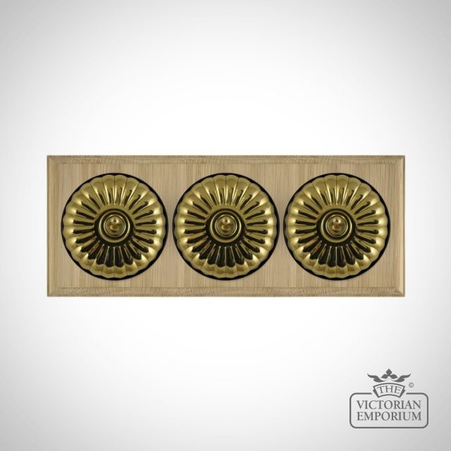 X3gang Tripple Toggle Period Light Switch Fluteted Polished Brass Black Natural Oak Base