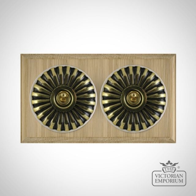 X2gang Double Toggle Period Light Switch Fluteted Antique Brass White Natural Oak Base