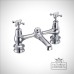 Two 2 hole mixerchome basin tap clr10 4