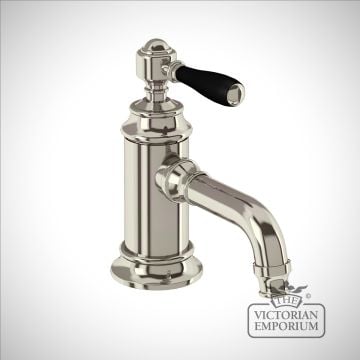 Single-lever basin mixer without pop up waste with black lever