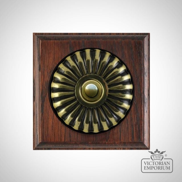 Buttonswitch Mahogany Base Fluteted Unlacquered Brass