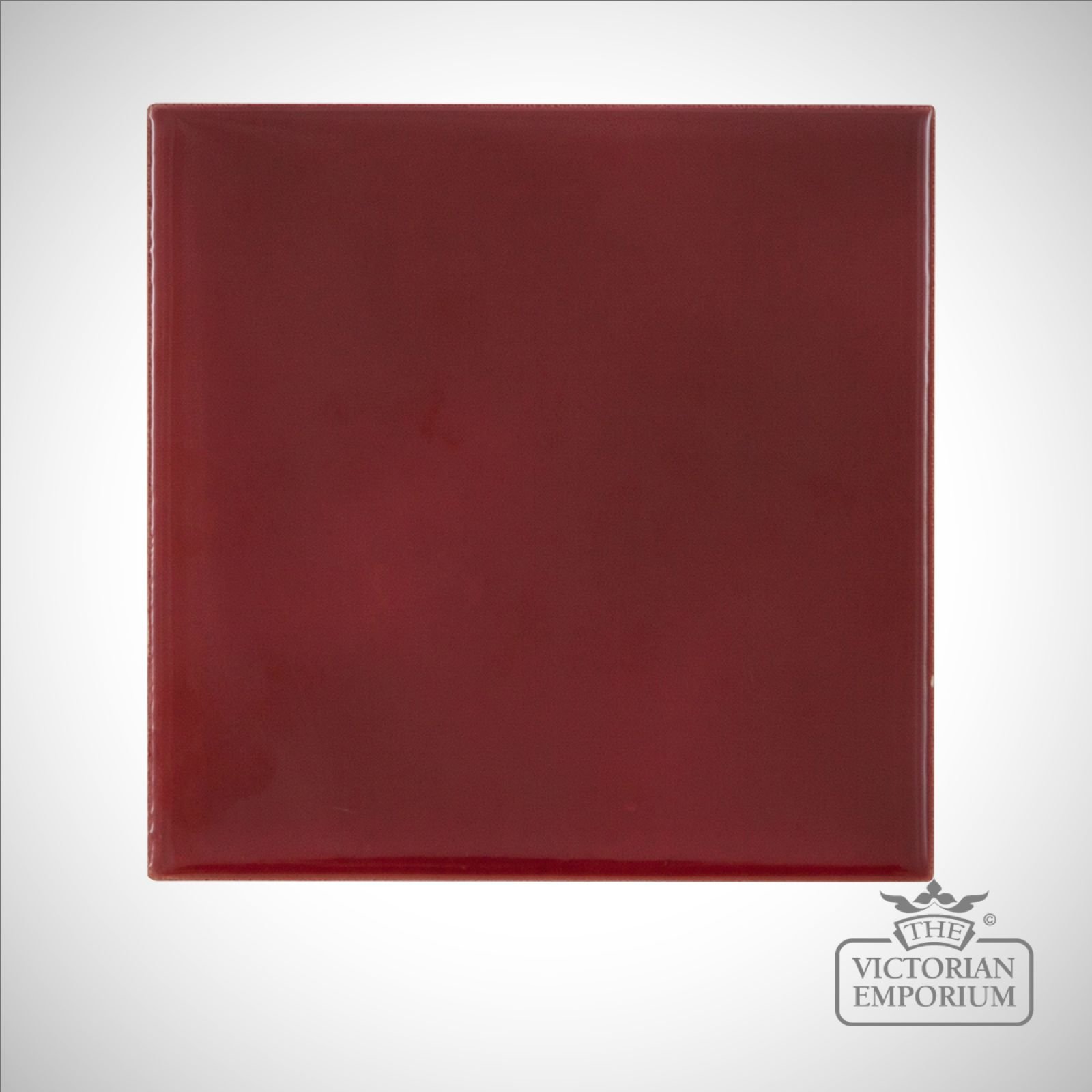 Deep red square fireplace tiles
