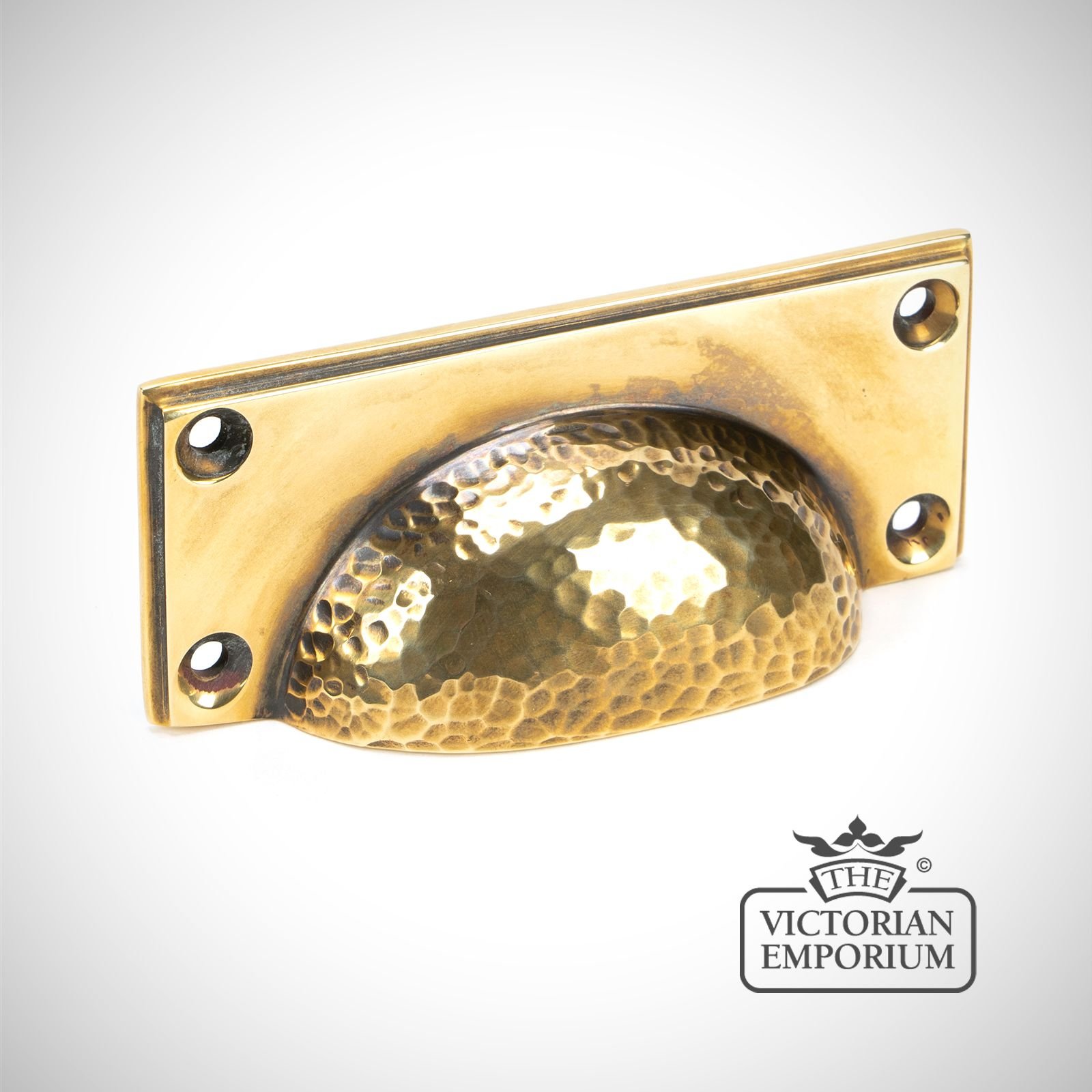 Hammered pull handle in aged brass