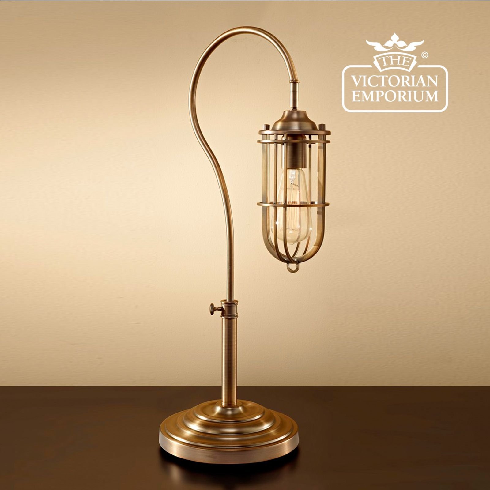 Table lamp in dark antique brass